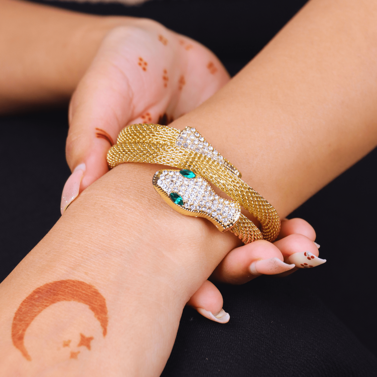 MIDAM™ Gold-Toned American Diamond Studded Wraparound Snake Design Bracelet