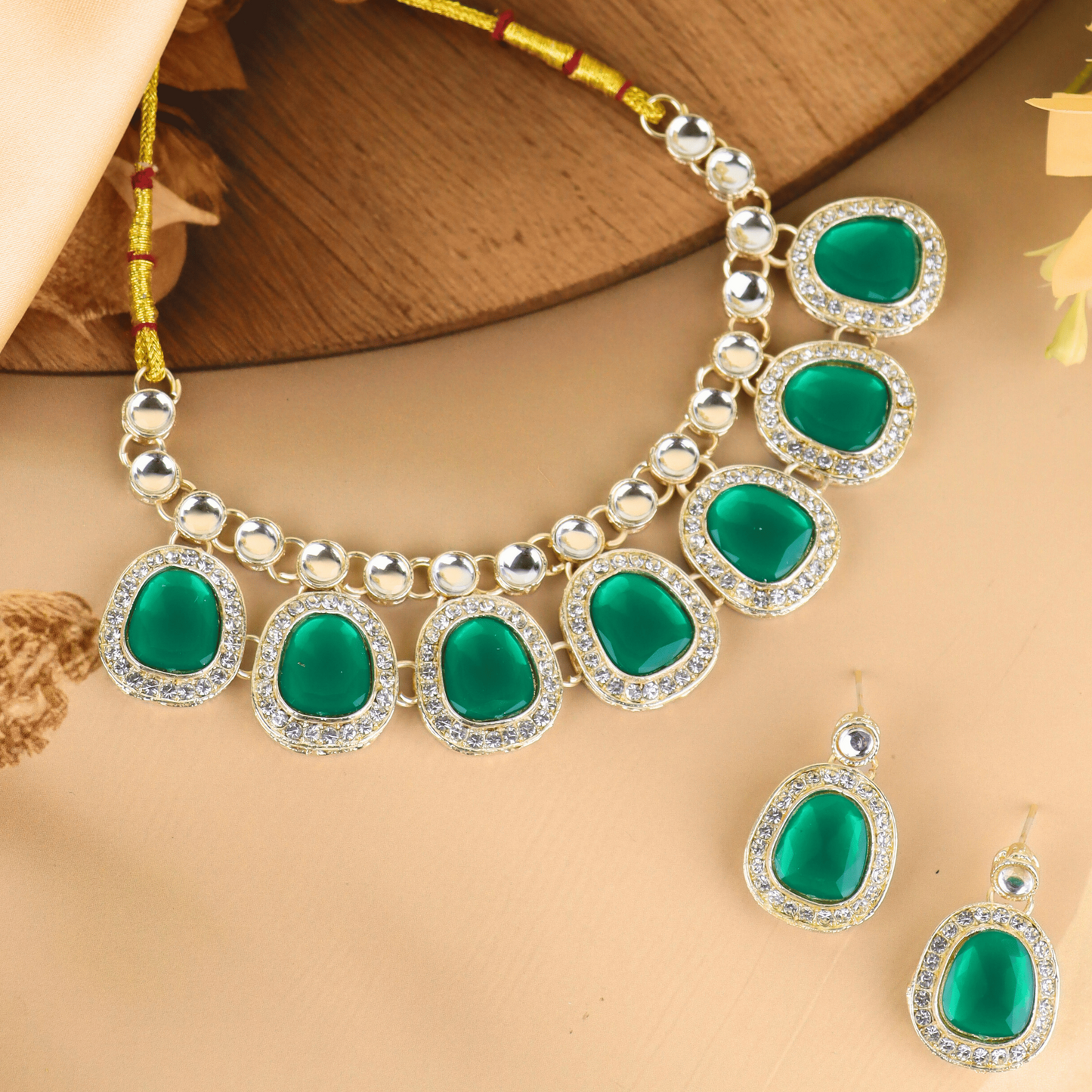 MIDAM™ Gold-Toned American Diamond Studded Green Cubic Zirconia Premium Jewellery Set