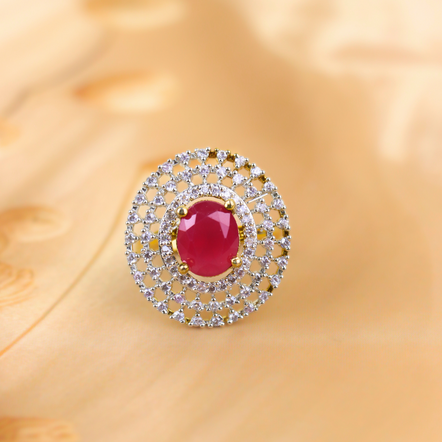 MIDAM™ Gold Toned American Diamond Studded Red Zirconia Finger Ring