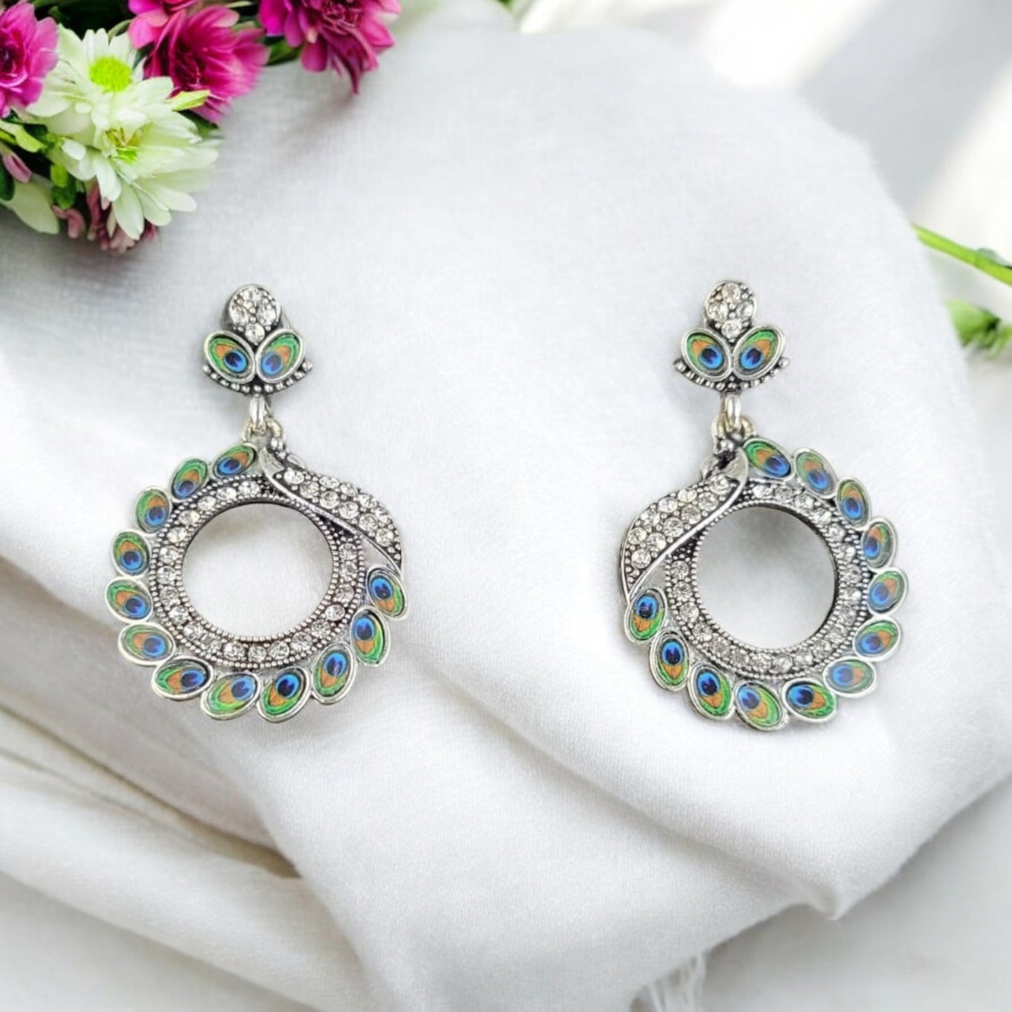 MIDAM™ Silver-toned AD Studded Circular Peacock Shaped Drop Earrings