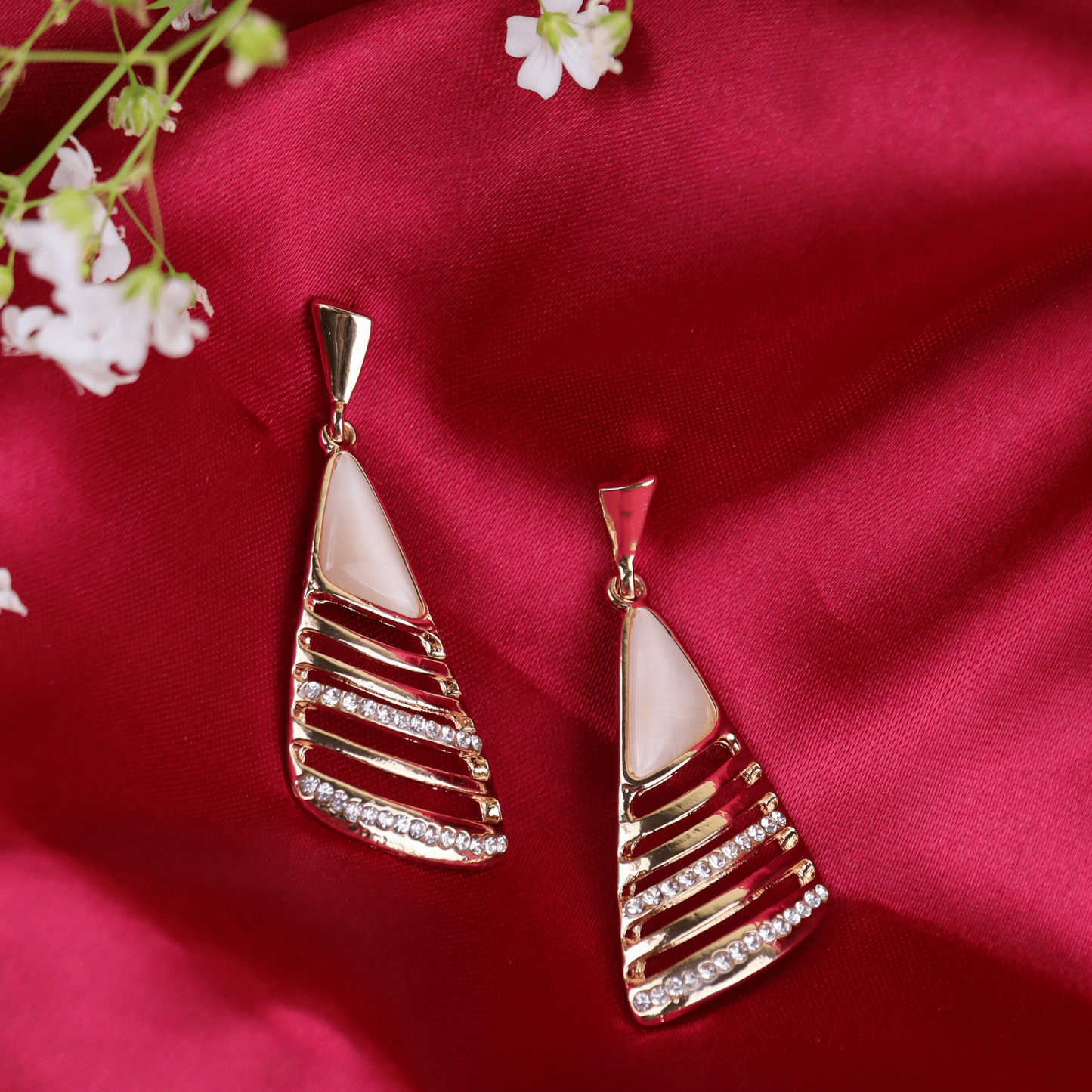 MIDAM™ Gold Plated American Diamond Studded Geometrical Shaped Drop Earrings