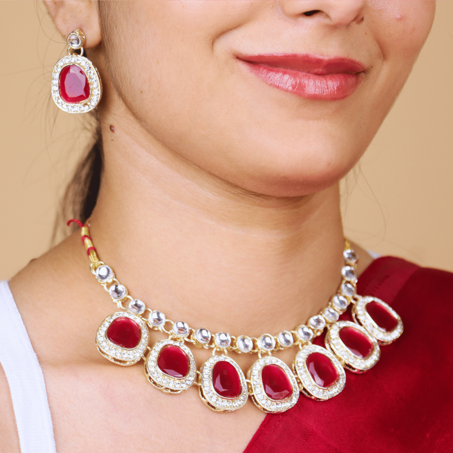 MIDAM™ Gold-Toned American Diamond Studded Red Cubic Zirconia Premium Jewellery Set