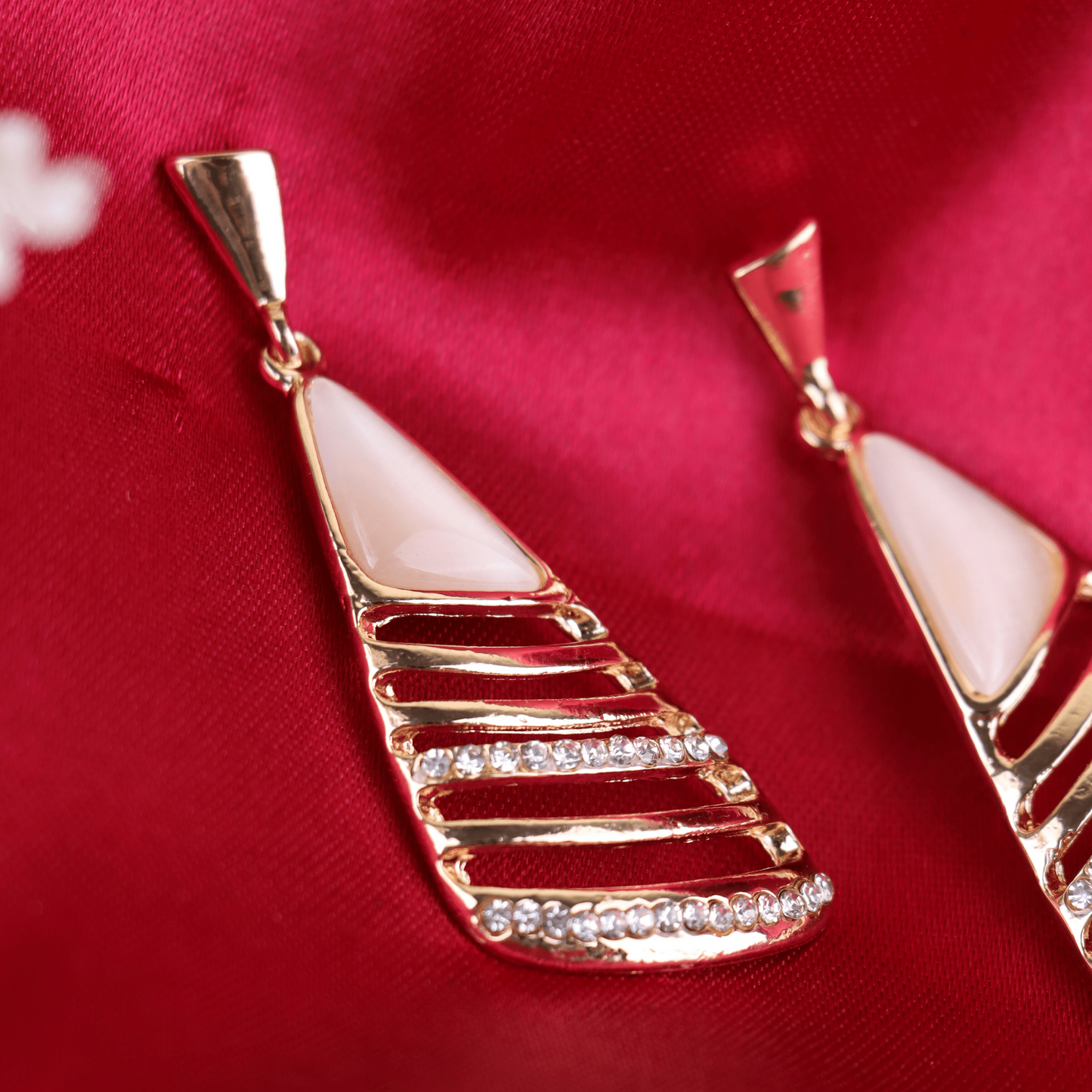 MIDAM™ Gold Plated American Diamond Studded Geometrical Shaped Drop Earrings