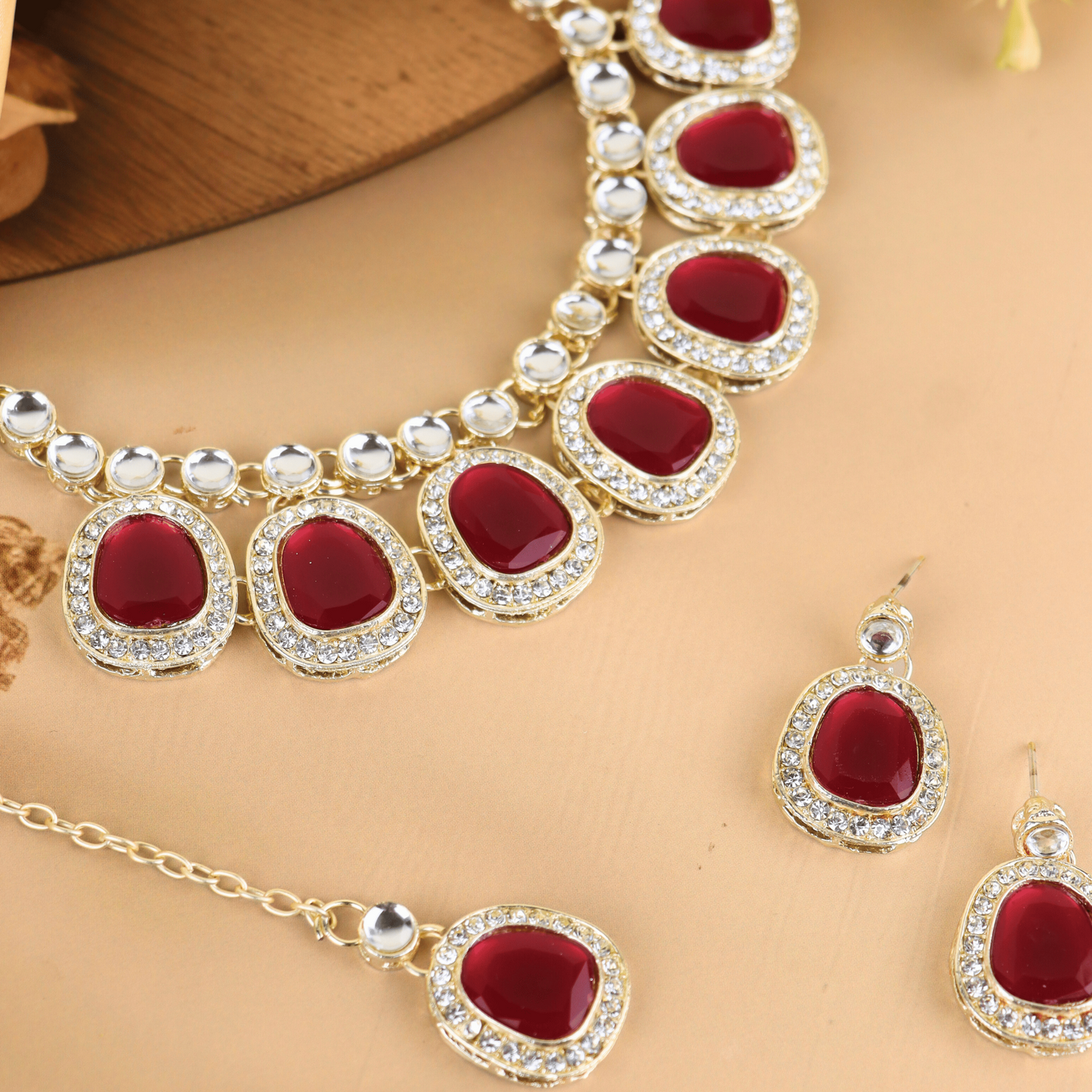 MIDAM™ Gold-Toned American Diamond Studded Red Cubic Zirconia Premium Jewellery Set