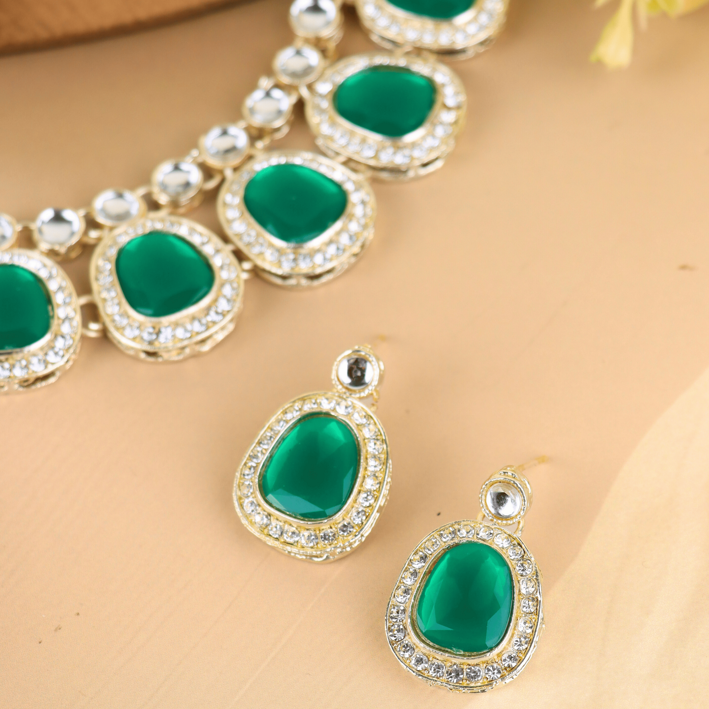 MIDAM™ Gold-Toned American Diamond Studded Green Cubic Zirconia Premium Jewellery Set