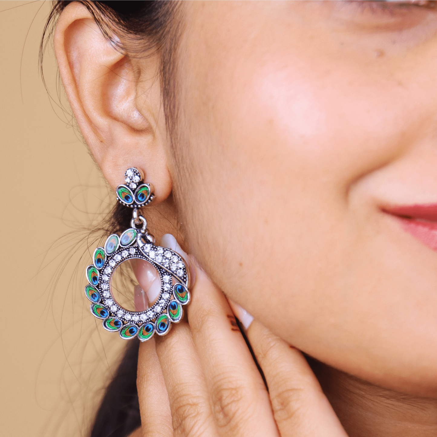 MIDAM™ Silver-toned AD Studded Circular Peacock Shaped Drop Earrings