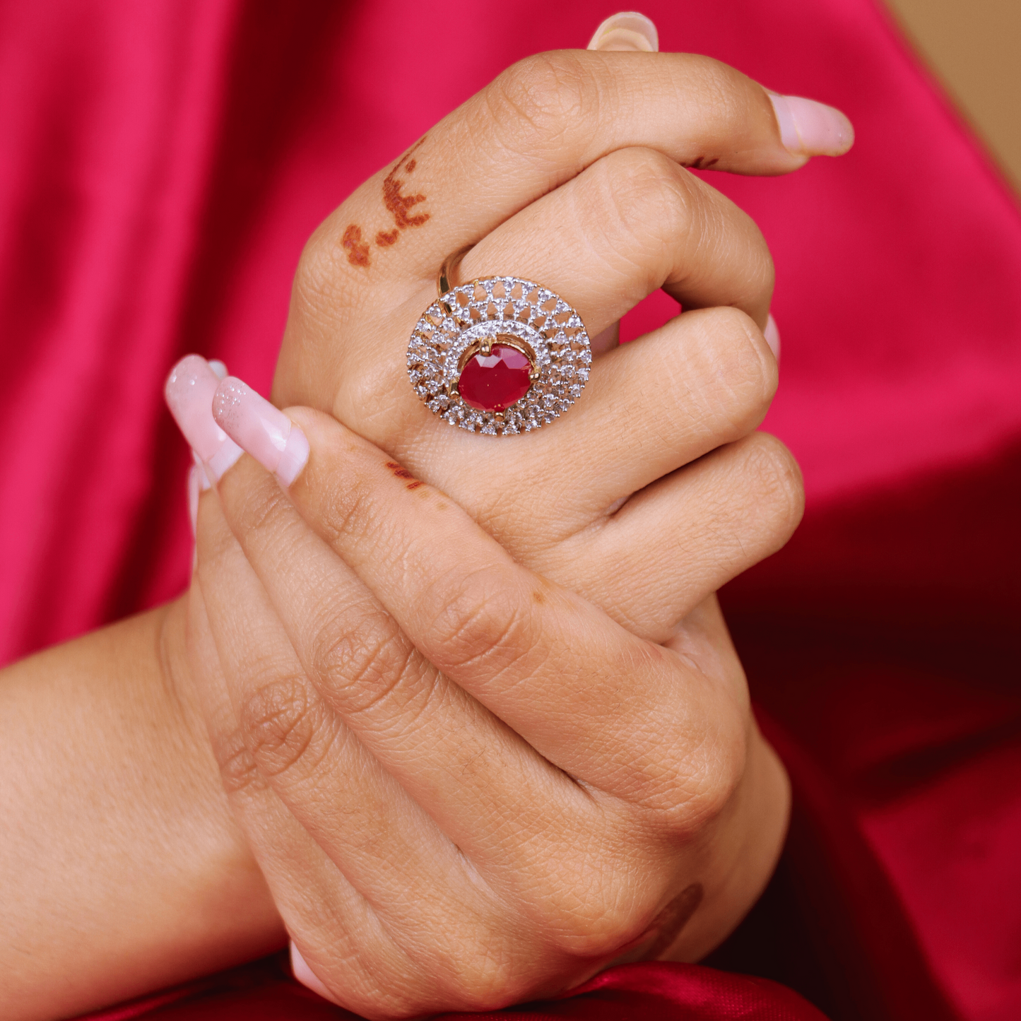 MIDAM™ Gold Toned American Diamond Studded Red Zirconia Finger Ring