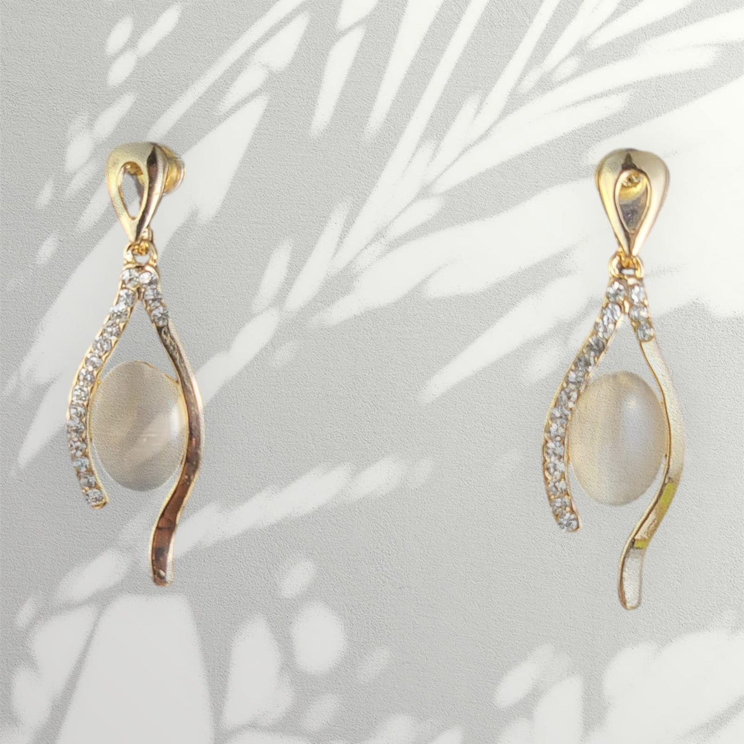 MIDAM™ Gold Plated American Diamond Studded Vertical Eye Drop Earrings