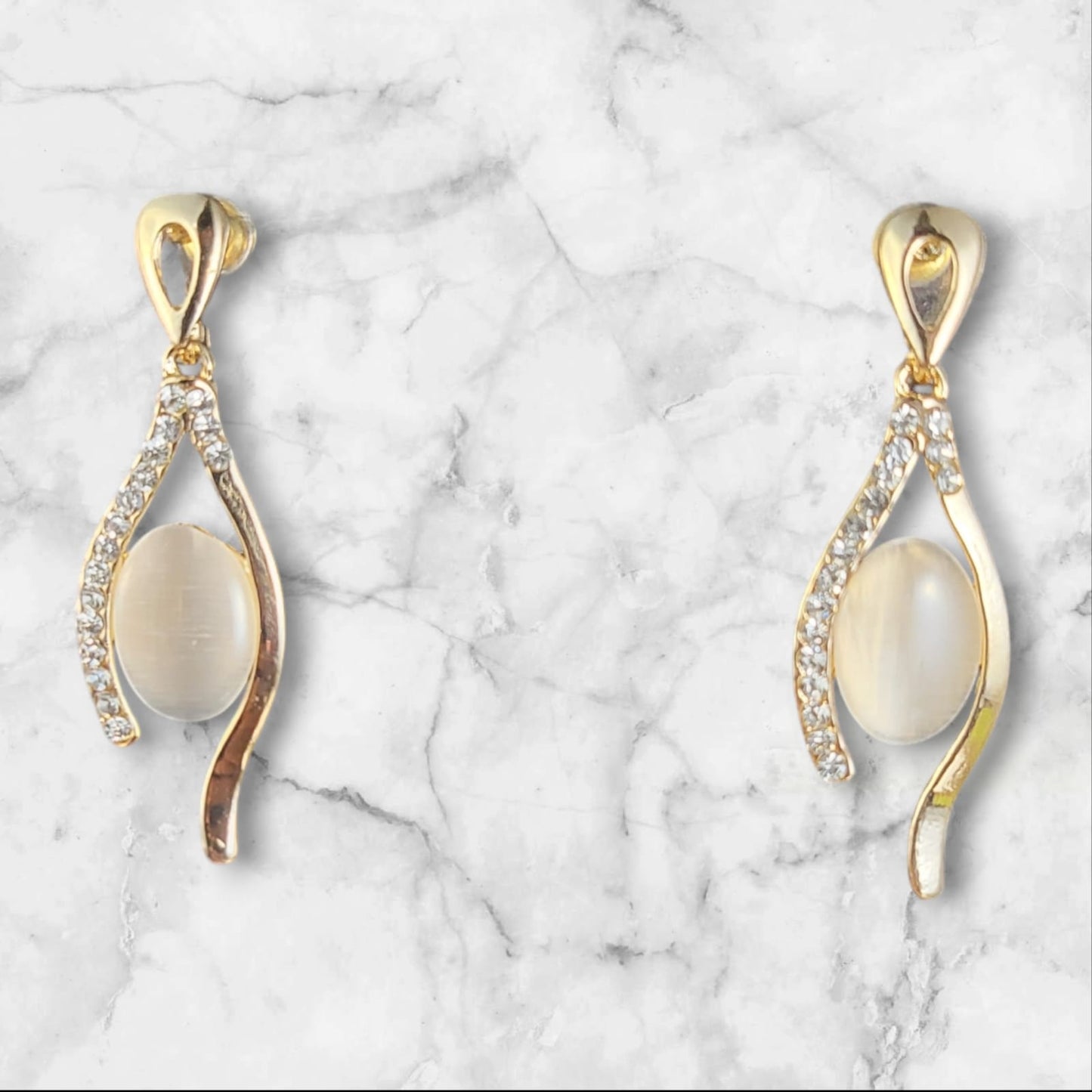 MIDAM™ Gold Plated American Diamond Studded Vertical Eye Drop Earrings