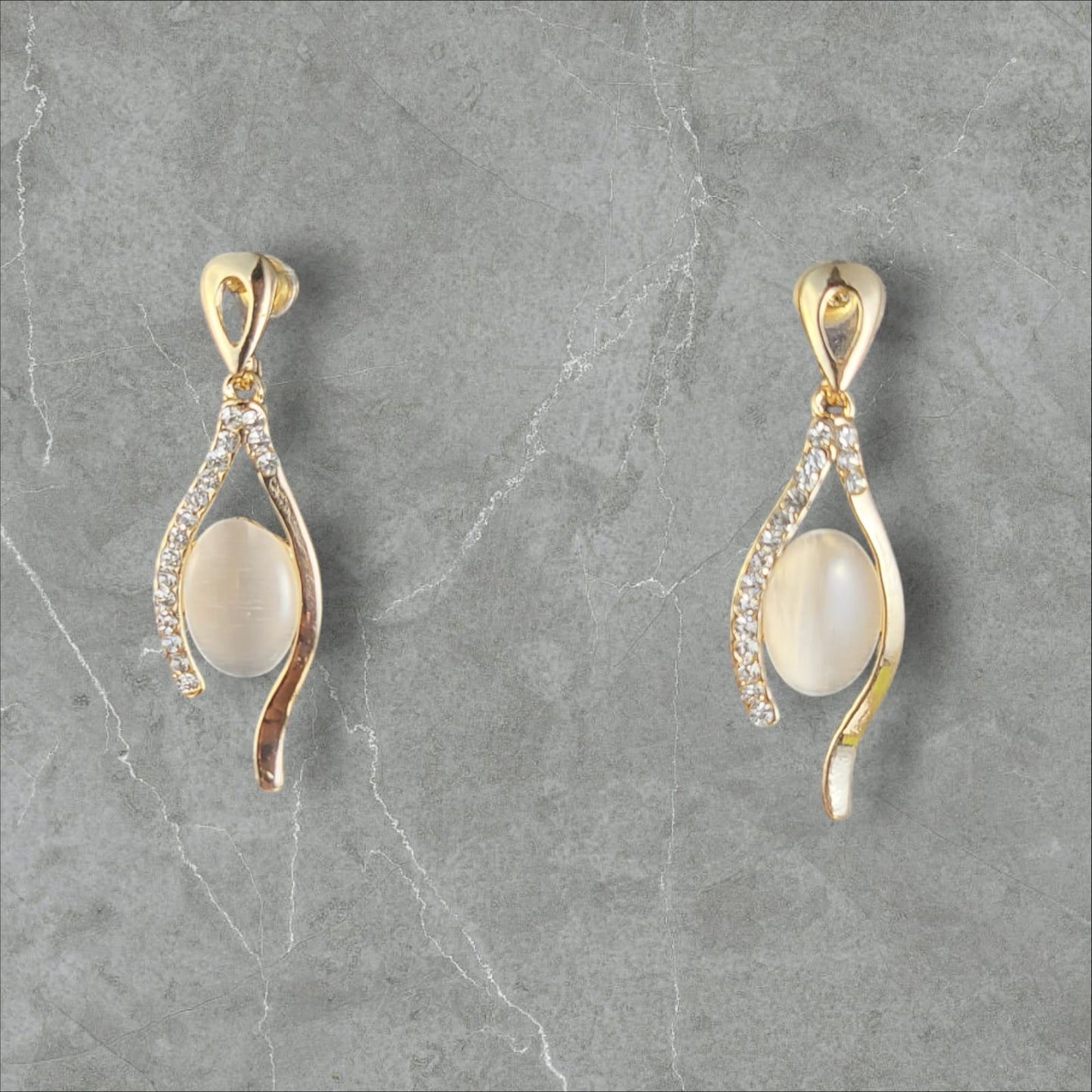 MIDAM™ Gold Plated American Diamond Studded Vertical Eye Drop Earrings