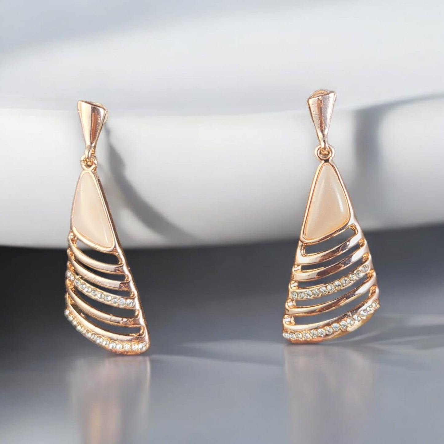 MIDAM™ Gold Plated American Diamond Studded Geometrical Shaped Drop Earrings