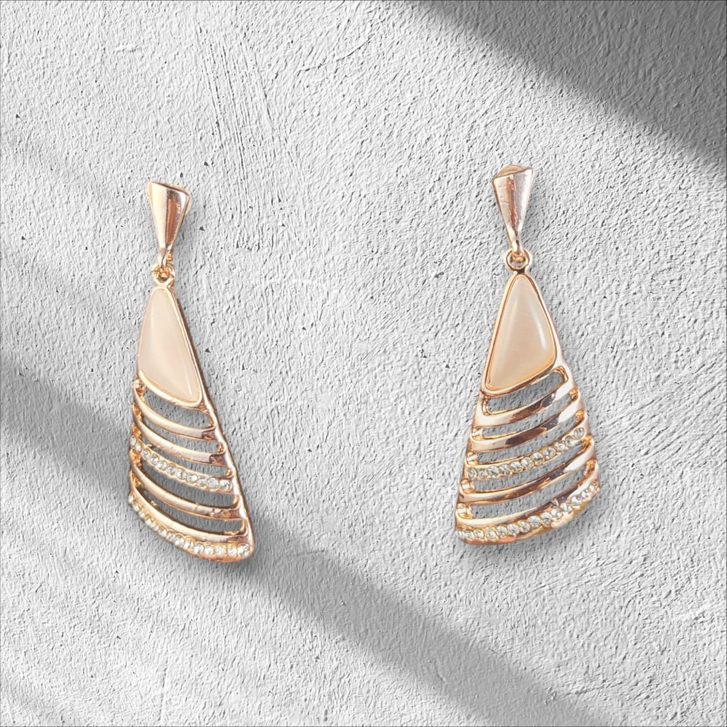 MIDAM™ Gold Plated American Diamond Studded Geometrical Shaped Drop Earrings