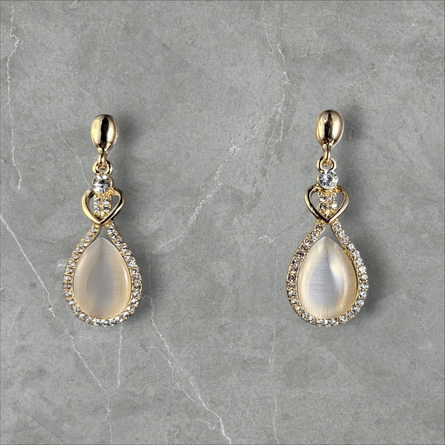 MIDAM™ Gold-Plated American Diamond Studded Heart & Water Drop Shaped Drop Earrings