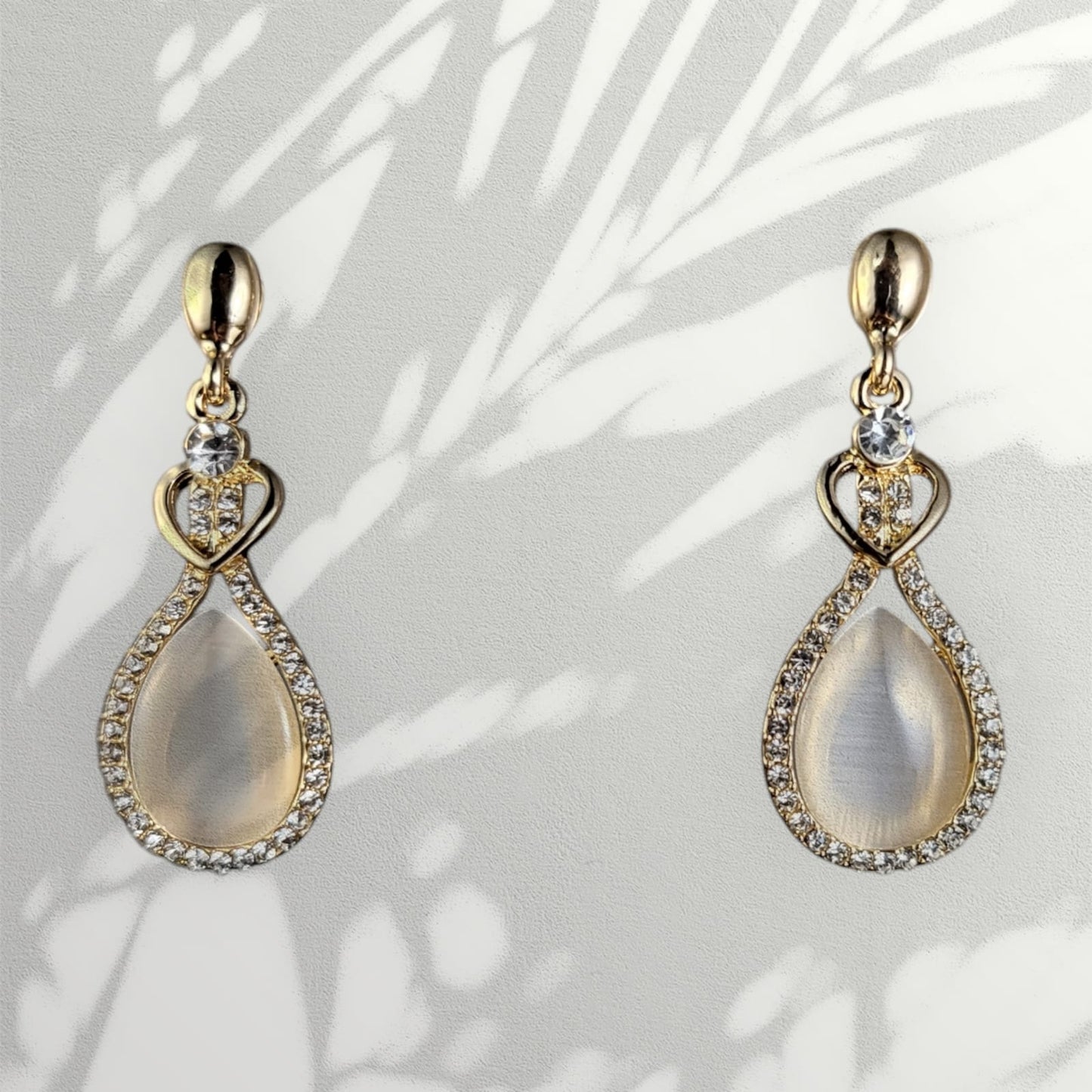 MIDAM™ Gold-Plated American Diamond Studded Heart & Water Drop Shaped Drop Earrings