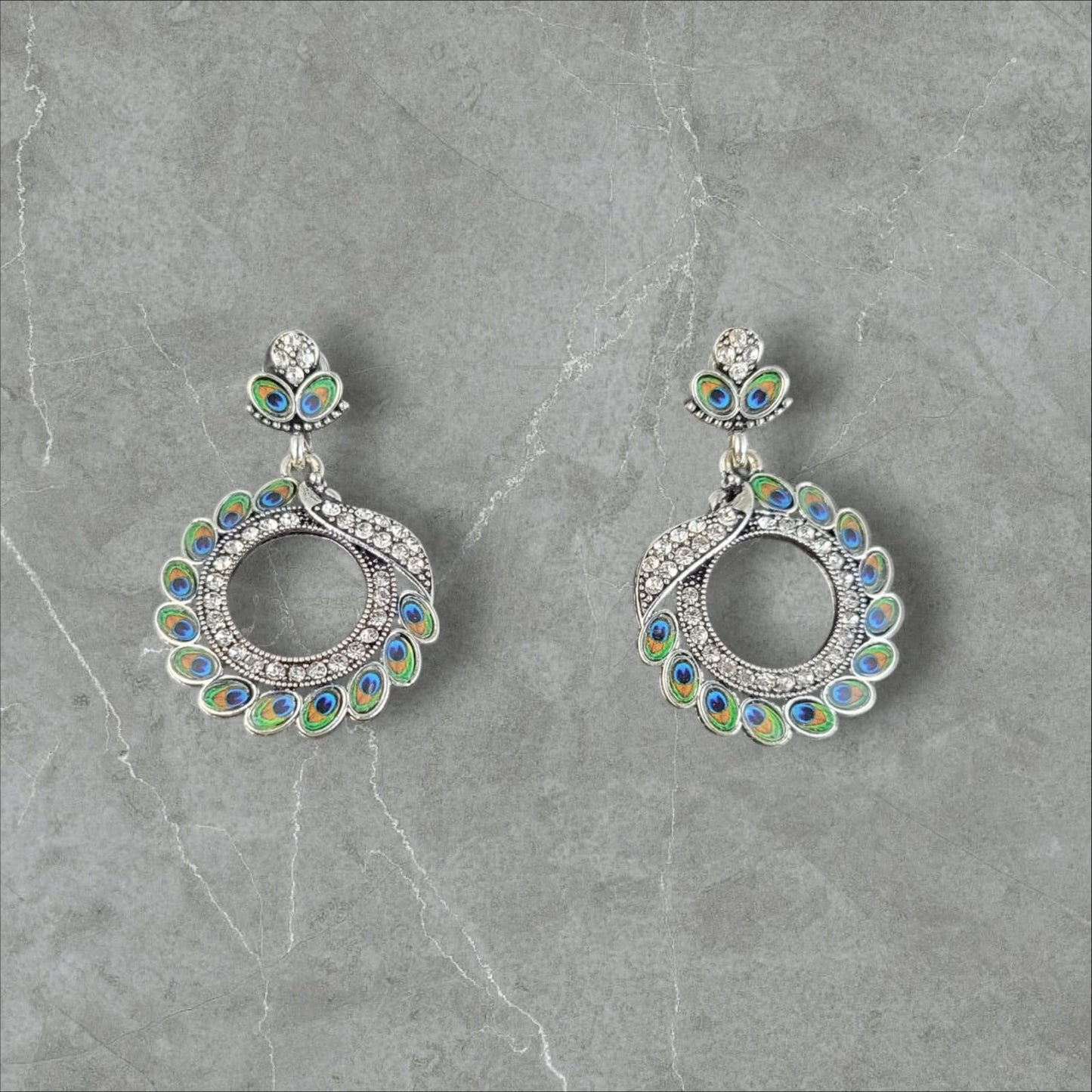 MIDAM™ Silver-toned AD Studded Circular Peacock Shaped Drop Earrings