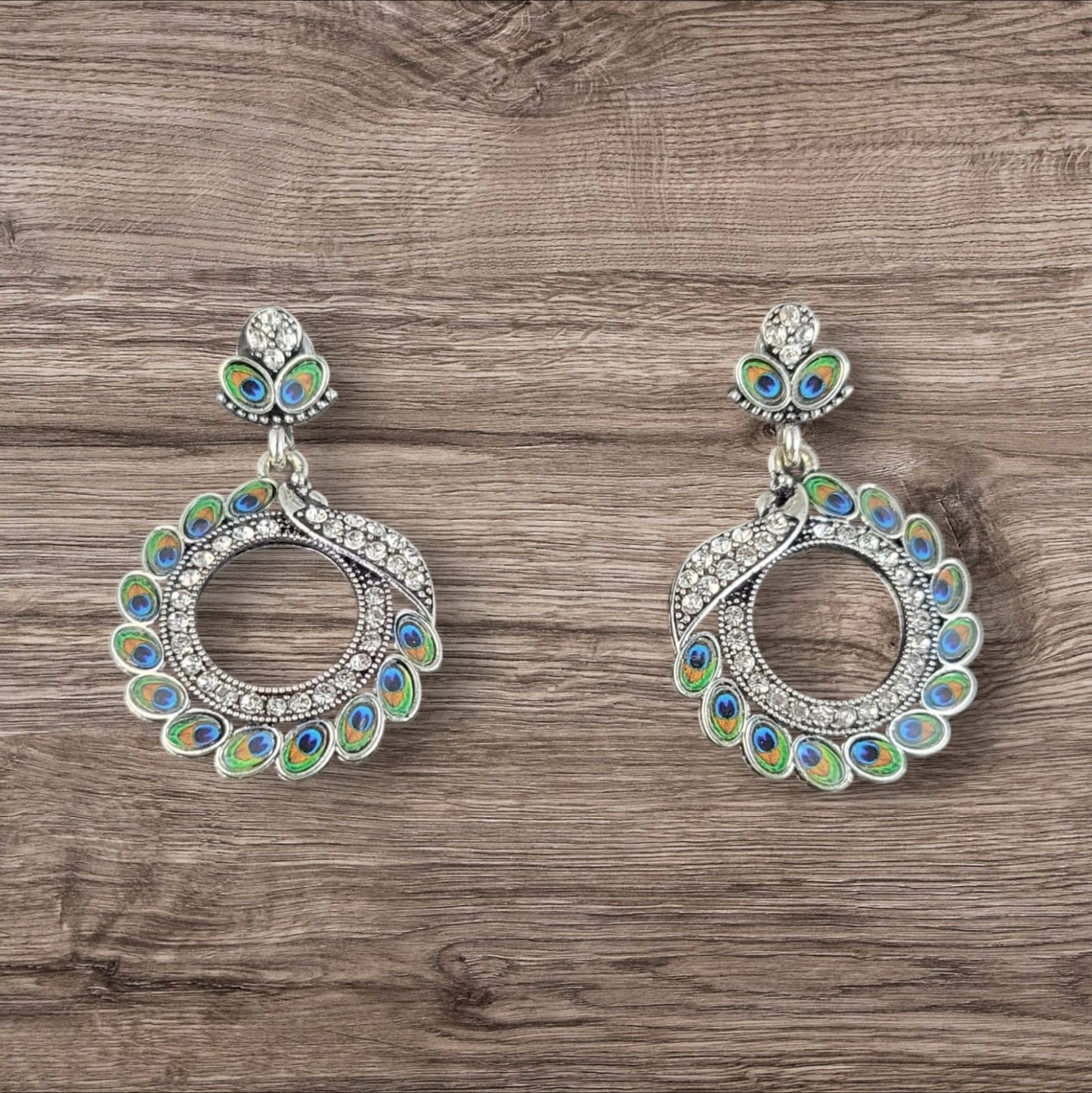 MIDAM™ Silver-toned AD Studded Circular Peacock Shaped Drop Earrings